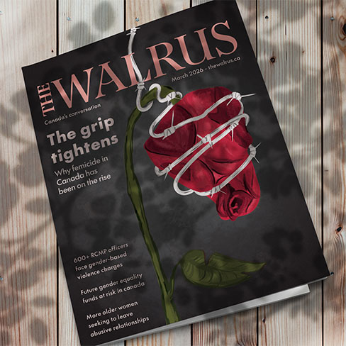 Person holding wilting rose walrus magazine outside on grass.