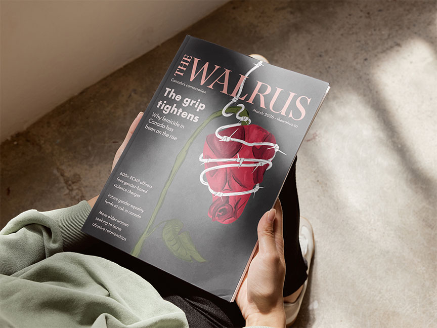 Image of a magazine closed and held by a person not in view. Magazine shows a wilting flower being constrained by barbed wire.